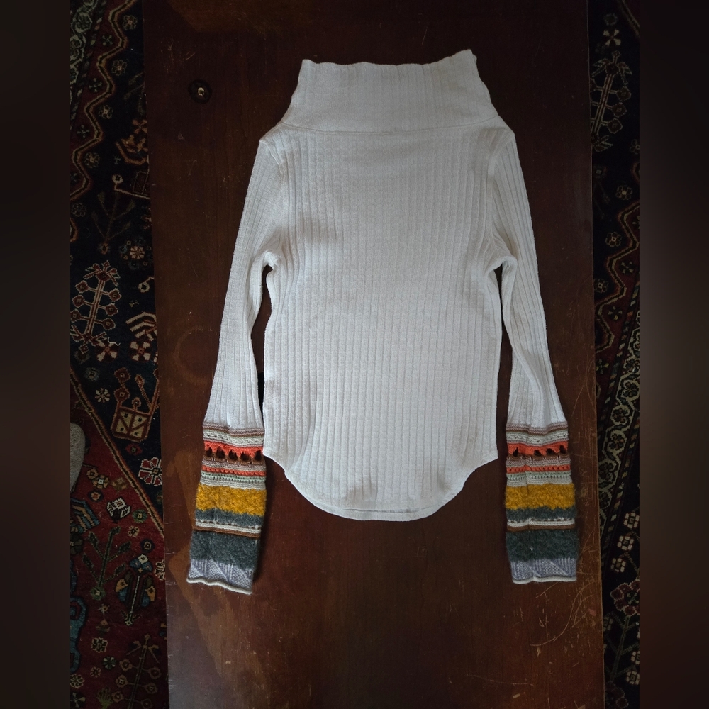 Cozy White Turtleneck Sweater with Colorful Knit Sleeves Sleeves